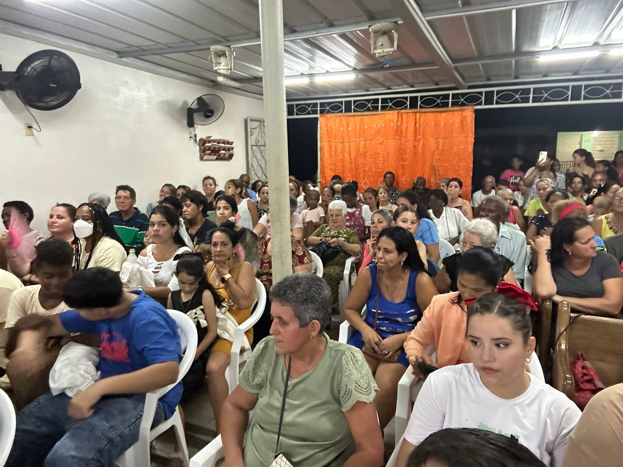 Worship in one of the house churches in Cuba