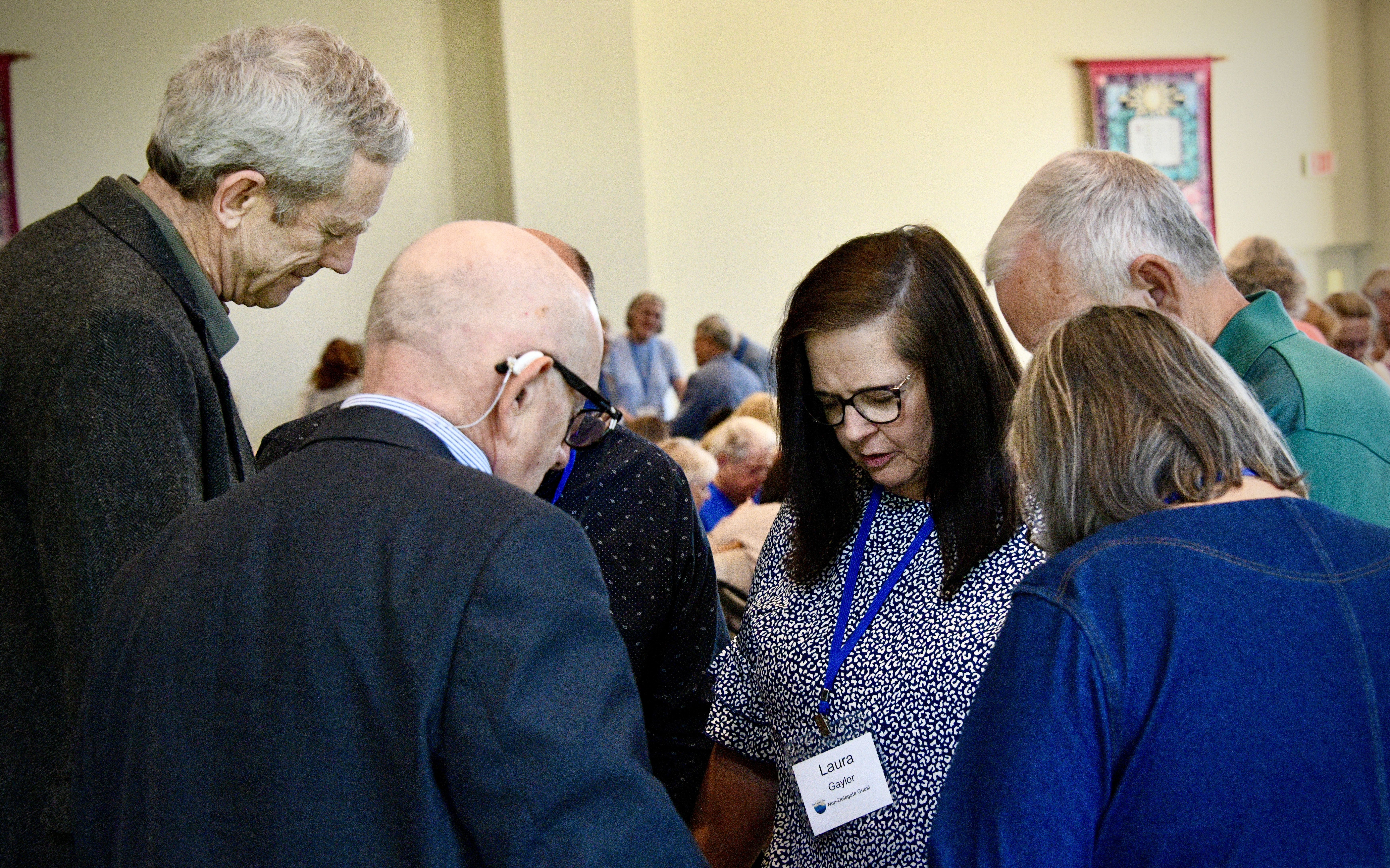 People praying together in a circle